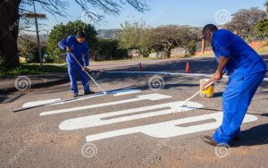 road-stop-sign-maintenance-painting-municipal-team-repairing-worn-out-lines-new-coat-paint-durban-suburb-south-africa-32545084